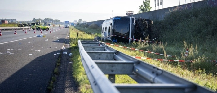 Emergency services work at the site of a raod accident between a delivery van and an Austrian tour bus, where multiple people were injured, on the A28 motorway near Wezep, eastern Netherlands, on August 24, 2026. (Photo by Jeroen Jumelet / ANP / AFP) / Netherlands OUT