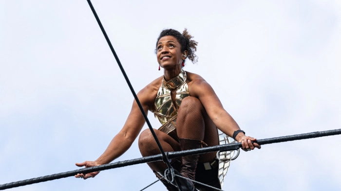 French highliner Tatiana Mosio-Bongonga walks along a 400-metre-long rope suspended between the twin slag heaps of Loos-en-Gohelle, at a height ranging from 80 to 186 metres above the ground and without a safety line, as part of the European Heritage Days in Loos-en-Gohelle, northern France, on September 20, 2026. Eighty meters above the ground, she linked the two highest slag heaps in Europe, balancing on a wire: to the sound of Pierre Bachelet’s “Les Corons,” tightrope walker Tatiana-Mosio Bongonga was applauded on September 20, 2026, by more than 9,000 spectators who came to admire her performance in the heart of the mining basin of Pas-de-Calais. (Photo by Sameer Al-DOUMY / AFP)