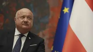 Austria's Chancellor Christian Stocker attends his meeting with Serbian President Aleksandar Vucic at the Serbia Palace in Belgrade, Serbia, Wednesday, Aug. 13, 2025. (AP Photo/Darko Vojinovic)