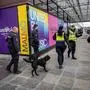Police use sniffer dogs to secure the area at the Malmo Arena, the venue of the Eurovision song contest (ESC) in Malmo, Sweden on April 26, 2024. (Photo by Johan NILSSON / TT News Agency / AFP) / Sweden OUT