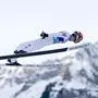 Manuel Fettner of Austria soars through the air during the men's FIS Ski Jumping World Cup competition at the Gross-Titlis Schanze on Sunday, Dec. 18, 2022 in Engelberg, Switzerland. (KEYSTONE/Philipp Schmidli)