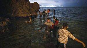 Migranten schwimmen nach Spanie