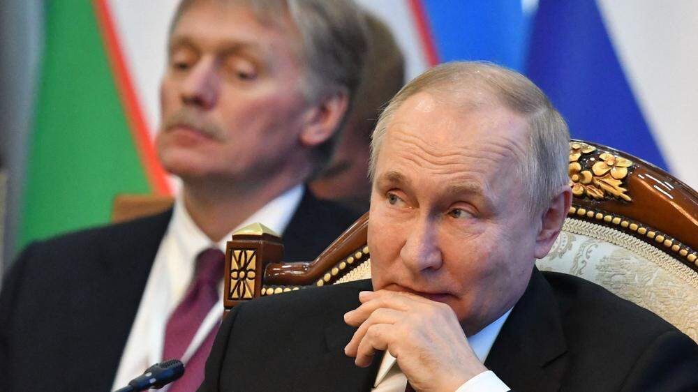 Putin und sein Sprecher Peskow