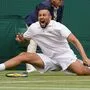 Nick Kyrgios mit einem offensichtlich unfreiwilligen Spagat
