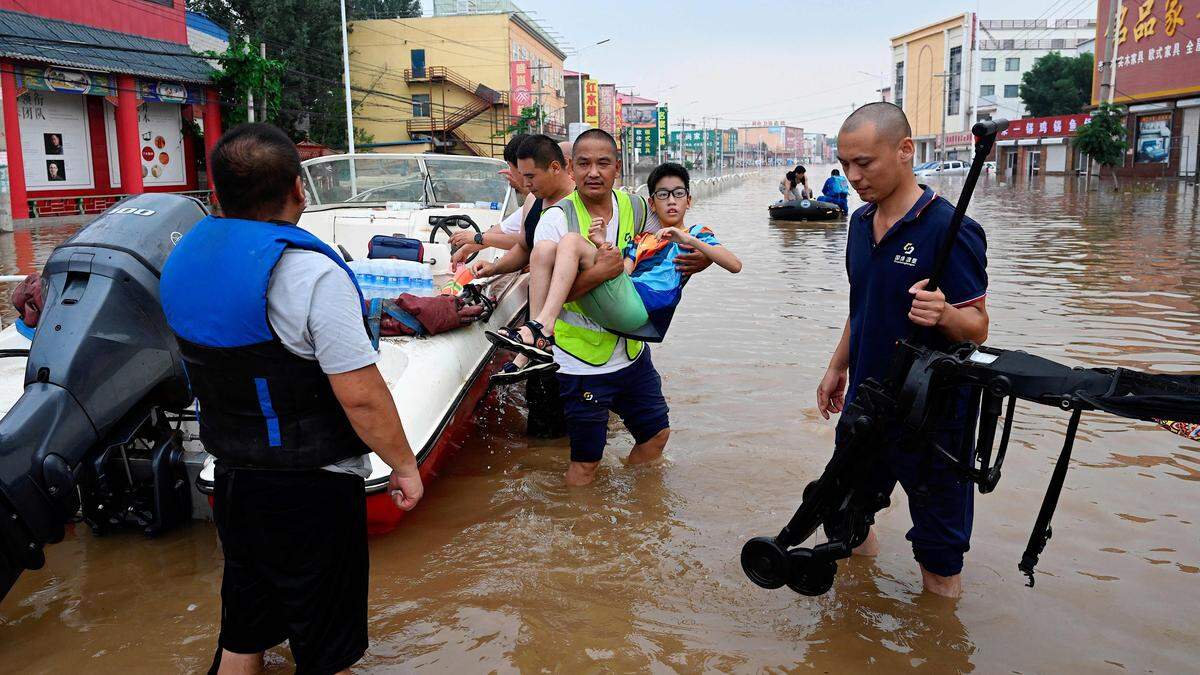 Dutzende Bewohner von Zhuozhou sind ertrunken, Hunderttausende Wohnungen sind zerstört
