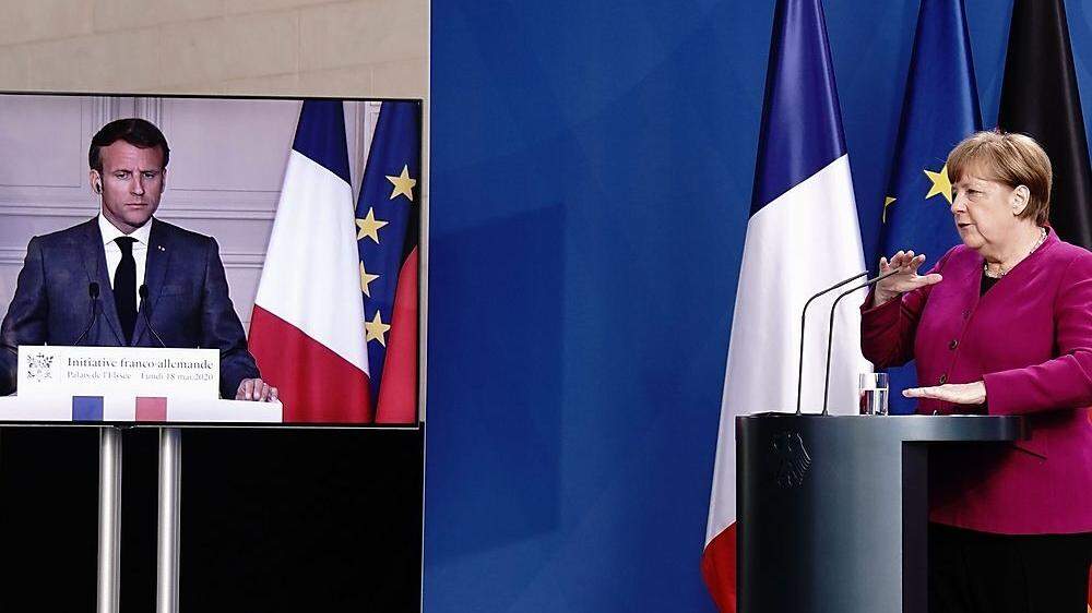 Frankreichs Präsident Macron war bei der Präsentation von Merkel zugeschalten