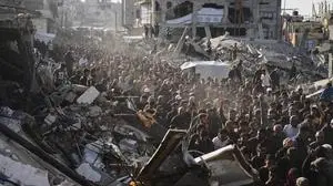 FILE - Palestinians attend a protest against the war and Hamas in Beit Lahiya, northern Gaza Strip, on Wednesday, March 26, 2025, in a rare show of public anger against the militant group that rules the territory. (AP Photo/Jehad Alshrafi, File)