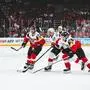 PRAGUE,CZECH REPUBLIC,12.MAY.24 - ICE HOCKEY - IIHF Ice Hockey World Championship 2024, group stage, Austria vs Switzerland. Image shows Steven Strong (AUT), Nino Niederreiter (SUI) and David Maier (AUT).
Photo: GEPA pictures/ Daniel Goetzhaber