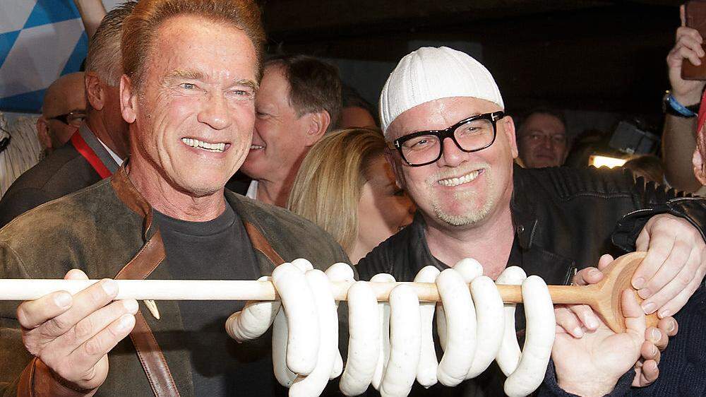 Werden wohl auch am Freitag wieder die Weißwurstparty beehren: Arnold Schwarzenegger und DJ Ötzi