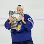 Jussi Olkinuora Nr.45 of Finland with trophy celebrate with the team after the match FINLAND - CANADA 4-3 after sudden death IIHF Ice hockey, Eishockey World Championship, WM, Weltmeisterschaft final in Tampere, Finland, May 29, 2022, Season 2021/2022 