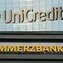 (FILES) (COMBO) This combination of pictures created on December 18, 2024 shows the logo of Italian bank Unicredit in Milan (top) and on May 13, 2020 the logo of German bank Commerzbank on one of the bank's branches in Berlin. German lender Commerzbank said on February 13, 2025 it plans to cut about 3,900 jobs, around 10 percent of its workforce, seeking to fight off pressure for a tie-up from Italian bank UniCredit. (Photo by GIUSEPPE CACACE and John MACDOUGALL / AFP)