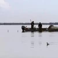 Fischer in der Lagune von Grado