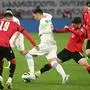 Greece's midfielder #11 Tasos Bakasetas and Georgia's midfielder Otar Kiteishvili vie for the ball during the UEFA EURO 2024 qualifying play-off final football match between Georgia and Greece in Tbilisi on March 26, 2024. (Photo by Vano SHLAMOV / AFP)
