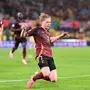 Belgium's midfielder #07 Kevin De Bruyne celebrates scoring his team's second goal with his teammates during the UEFA Euro 2024 Group E football match between Belgium and Romania at the Cologne Stadium in Cologne on June 22, 2024. (Photo by Kirill KUDRYAVTSEV / AFP)