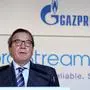 (FILES) This file photo taken on April 24, 2017 shows the Head of the supervisory board of Gazprom's Nord Stream 2 and former German Chancellor Gerhard Schroeder delivering a speech during a signing ceremony for the Nord Stream 2 gas pipeline agreement in Paris. - Russian opposition leader Alexei Navalny on Wednesday, October 7, 2020 urged the European Union to impose tough targeted sanctions including entry bans against key figures in or backing Vladimir Putin's government over his poisoning. In an interview with Bild daily, the Kremlin critic had harsh words for German ex-chancellor Gerhard Schroeder, who chairs the board of Russia's state-controlled oil major Rosneft and heads the shareholders' committee for the Nord Stream pipeline company. "Schroeder is Putin's errand boy who is protecting murderers", Navalny said. (Photo by ERIC PIERMONT / AFP)