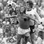 File - Germany's Rainer Bonhof, right, and Johan Neeskens of the Netherlands challenge for the ball during the finals of the Soccer World Cup, on July 7, 1974, at the Olympic Stadium, in Munich, Germany. (AP-Photo/stf, File)