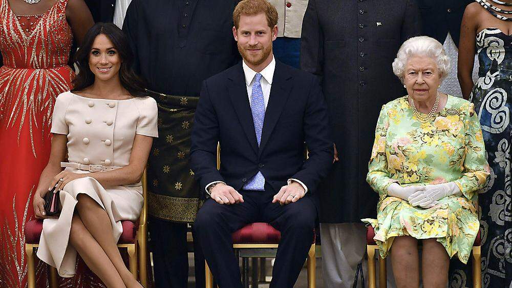 Meghan, Harry und die Queen auf einem Bild aus besseren Tagen