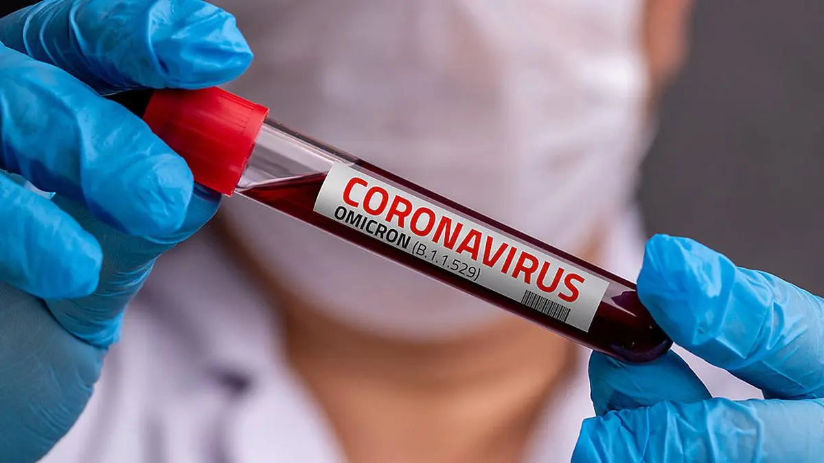 Doctor with blood sample of Covid-19 Omicron B.1.1.529 Variant and general data of covid-19 Coronavirus Mutations.