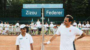 Izyan &quot;Zizou&quot; Ahmad und Roger Federer 