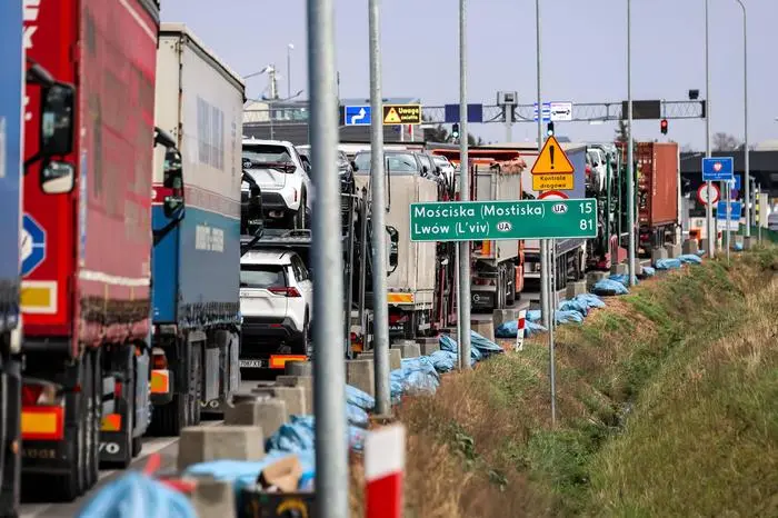 November 27, 2023, Medyka, Podkarpacke, Poland: Trucks stand in a queue to cross the border in Medyka as Polish farmers strike and block truck transport in Medyka - border crossing between Poland and Ukraine. The farmers joined the transport sector on November 24 in the strike against poor management of agricultural imports of Ukrainian produce as well as to demand renegotiation of transport deals between Ukraine and the European Union. Medyka is the fourth strike site. Protesters already blocked 3 other crossings for truck transport, allowing only 4 trucks per an hour excluding humanitarian and military aid and sensitive chemical and food goods. The strike started on the November 6. According to Ukrainian drivers, the queue to Medyka cross - ZUMAs197 20231127_aaa_s197_299 Copyright: xDominikaxZarzyckax
