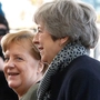 Merkel und May