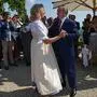 Austrian Foreign Minister Karin Kneissl and Russian President Vladimir Putin dance during her wedding on August 18, 2018 in Gamlitz, Styria, Austria. (Photo by Alexei Druzhinin / Sputnik / AFP)