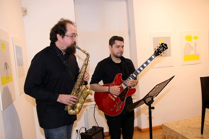 Für den musikalischen Rahmen sorgten Paul Gritsch am Saxofon und Sina Shaari an der Gitarre.