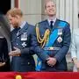 (FILES) In this file photo taken on July 10, 2018 (L-R) Britain's Meghan, Duchess of Sussex, Britain's Prince Harry, Duke of Sussex, Britain's Prince William, Duke of Cambridge and Britain's Catherine, Duchess of Cambridge stand on the balcony of Buckingham Palace to watch a military fly-past to mark the centenary of the Royal Air Force (RAF). - Britain's Prince Harry and his wife Meghan will step back as senior members of the royal family and spend more time in North America, the couple said in a shock announcement on January 8, 2020. The surprise news follows a turbulent year for the monarchy, with signs that the couple have increasingly struggled with the pressures of royal life and family rifts. "We intend to step back as 'senior' members of the royal family and work to become financially independent, while continuing to fully support Her Majesty The Queen," they said in a statement released by Buckingham Palace. (Photo by Tolga AKMEN / AFP)