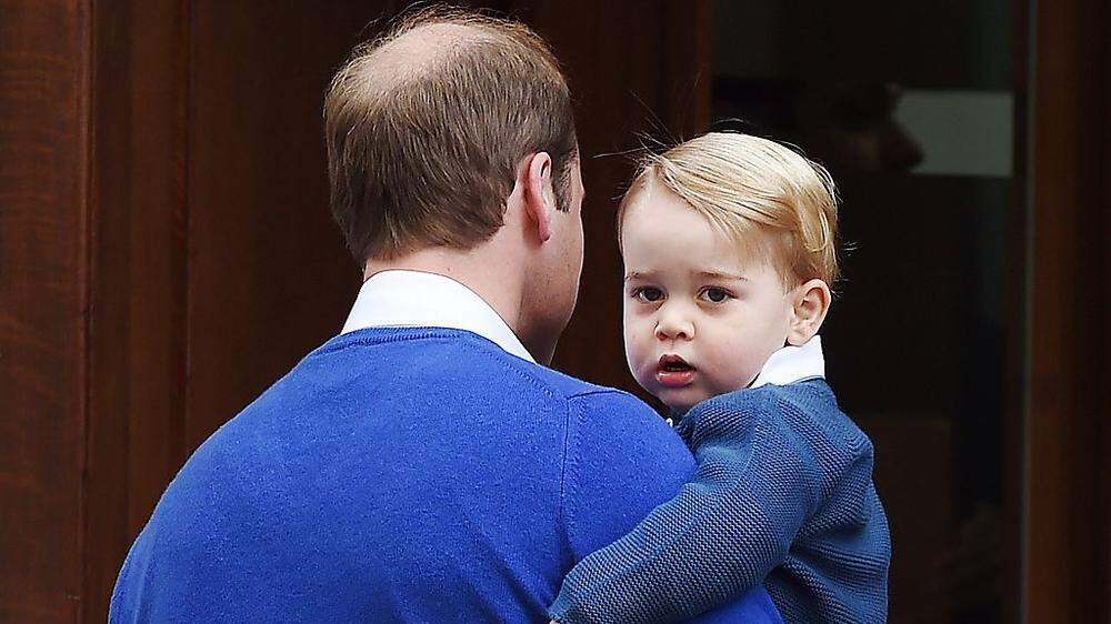 Prinz George im Arm von Papa Prinz William