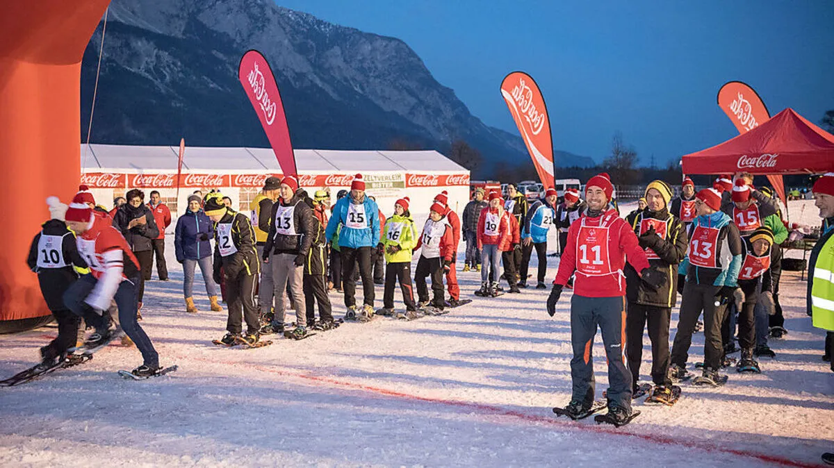 Promis und Athleten Hand in Hand