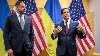 US Secretary of State Marco Rubio (R) and Ukraine's Presidential Office Chief of staff Andriy Yermak hold a press conference following their closed-door talks on a US plan to end the war in Ukraine at the US Mission in Geneva, on November 23, 2025. US Secretary of State Marco Rubio arrived in Geneva on November 23, 2025 morning for discussions on a US plan to end the Ukraine war, after Washington signalled room for negotiation on the controversial proposal. Ukrainian, European and Canadian officials were also gathering in the Swiss city. (Photo by Fabrice COFFRINI / AFP)