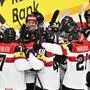 Austria's players celebrate their victory over Slovenia 3-2 after the IIHF Men's Ice Hockey World Championship match between Slovenia and Austria in Stockholm, on May 18, 2025. (Photo by Anders WIKLUND / TT News Agency / AFP) / Sweden OUT