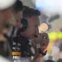 Red Bull Racing team principal Christian Horner watches the race from the garage during the Bahrain Formula One Grand Prix at the Bahrain International Circuit in Sakhir on April 13, 2025. (Photo by Andrej ISAKOVIC / POOL / AFP)
