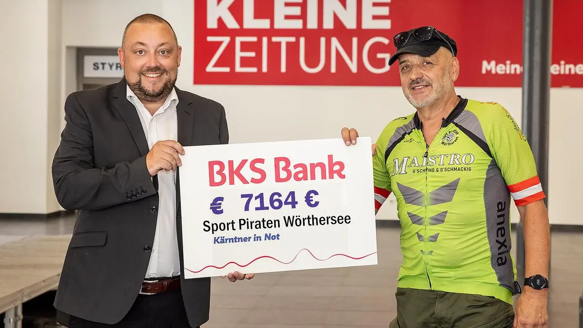 Sport-Piraten-Obmann Kurt Frischengruber übergibt 7164 Euro für "Kärntner in Not" an Albert Lesjak 