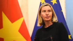 (FILES) European Union's foreign policy chief Federica Mogherini addresses the media at the Government guesthouse in Hanoi on August 5, 2019. The EU's former foreign policy chief Federica Mogherini has been charged along with two others in a probe into "fraud and corruption" over contracts to train future European diplomats, the European Public Prosecutor's Office said on December 3, 2025. (Photo by Nhac NGUYEN / AFP)
