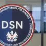 The logo of Austria's new Directorate for State Security and Intelligence Service (DSN), is pictured in Vienna on January 25, 2022. Some radicalised activists who reject Covid vaccines and anti-virus measures are crossing borders to join protests where extremist ideology is being spread, Austria's new domestic intelligence chief told AFP, calling the trend "very scary". (Photo by ALEX HALADA / AFP)