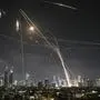 Israeli Iron Dome air defense system fires to intercept missiles over Tel Aviv, Israel, Friday, June 13, 2025. (AP Photo/Leo Correa)