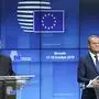 President of the European Commission Jean-Claude Juncker (L) and European Council President Donald Tusk addresse media representatives at a press conference during a European Union Summit at European Union Headquarters in Brussels on October 18, 2019. (Photo by Aris OIKONOMOU / AFP)