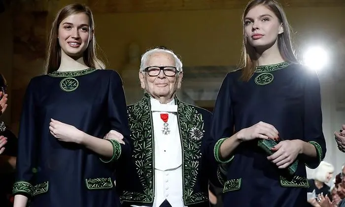 (FILES) This file photo taken on November 30, 2016 shows French fashion designer Pierre Cardin applauded by the audience at the end of a retrospective show at the Institut de France, in Paris. - French fashion designer Pierre Cardin, hailed for his visionary creations but also for bringing stylish clothes to the masses, died on December 29, 2020 aged 98, his family told AFP. Cardin who was born in Italy in 1922 but emigrated to France as a small child, died in a hospital in Neuilly in the west of Paris, his family said. (Photo by FRANCOIS GUILLOT / AFP)