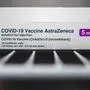 Boxes of vials of the Oxford/AstraZeneca Covid-19 vaccine are seen in a refridgerator at Ashton Gate Stadium in Bristol on January 9, 2021 one of seven mass vaccination centres which are set to open next week as Britain continues its vaccination programme against Covid-19. - Ashton Gate is one of the seven seven mass vaccination hubs opening around the country from next week. UK health officials and ministers have described the vaccination roll-out as a head-to-head race against the virus and the vaccination programme as the best hope of a return to normality. (Photo by Andrew Matthews / POOL / AFP)