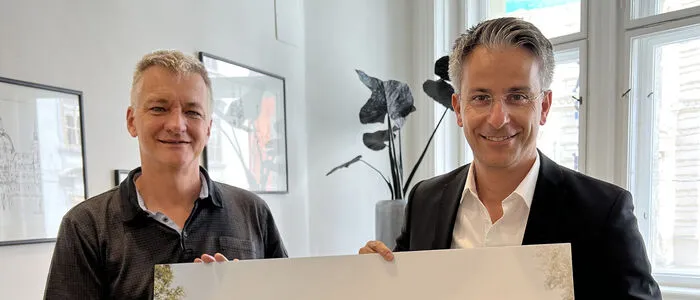 Finanzstadtrat Manfred Eber (KPÖ) und Bildungsstadtrat Kurt Hohensinner (ÖVP), hier mit dem geplanten Schulausbau zur VS Reininghaus, die umgesetzt wurde