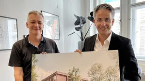 Finanzstadtrat Manfred Eber (KPÖ) und Bildungsstadtrat Kurt Hohensinner (ÖVP), hier mit dem geplanten Schulausbau zur VS Reininghaus, die umgesetzt wurde