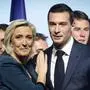 FILE - Leader of the French far-right National Rally Marine Le Pen, left, and lead candidate of the party for the upcoming European election Jordan Bardella during a political meeting on June 2, 2024 in Paris. Jordan Bardella, Le Pen's 28-year-old protégé who she'd been hoping to install as prime minister, grumbled that "the alliance of dishonor" between the National Rally's rivals kept it from power. (AP Photo/Thomas Padilla, File)