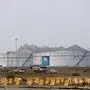 Storage tanks are seen at the North Jiddah bulk plant, an Aramco oil facility, in Jiddah, Saudi Arabia, Sunday, Sept. 15, 2019. The weekend drone attack in Buqyaq on one of the world's largest crude oil processing plants that dramatically cut into global oil supplies is the most visible sign yet of how Aramco's stability and security is directly linked to that of its owner -- the Saudi government and its ruling family. (AP Photo/Amr Nabil)