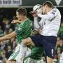 Andrea Belotti of Italy, right, and Jonny Evans of Northern Ireland compete for the ball during the World Cup 2022 group C qualifying soccer match between Northern Ireland and Italy at Windsor Park stadium in Belfast, Northern Ireland, Monday, Nov. 15, 2021. (AP Photo/Peter Morrison)