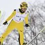 Japan's Noriaki Kasai jumps into the air during a qualifying session prior to the FIS Ski Jumping World Cup event in Sapporo, Hokkaido prefecture on January 20, 2023. (Photo by Kazuhiro NOGI / AFP)
