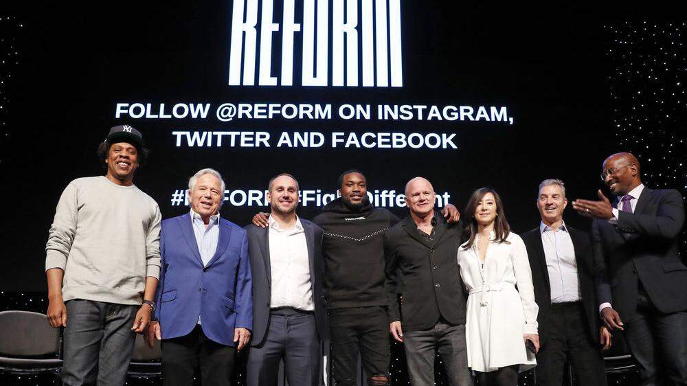 Shawn 'Jay-Z' Carter (links) mit anderen Unterstützern von &quot;Reform&quot;
