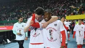 251119 -- VIENNA, Nov. 19, 2025 -- David Alaba front, R and Michael Gregoritsch of Austria celebrate victory after the 2026 World Cup European Qualifiers match between Austria VS Bosnia and Herzegovina in Vienna, Austria, Nov. 18, 2025.  SPAUSTRIA-VIENNA-FOOTBALL-2026 WORLD CUP EUROPEAN QUALIFIERS-AUSTRIA VS BOSNIA AND HERZEGOVINA HexCanling PUBLICATIONxNOTxINxCHN