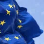 The flag of The European Union flapping in the wind. Economic and finance Community. Politics and Economy. Transnational political government