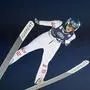 Austria's Eva Pinkelnig soars through the air during the Women's Individual HS138 of the FIS Ski Jumping World Cup in Trondheim, Norway on March 13, 2024. (Photo by Geir Olsen / NTB / AFP) / Norway OUT